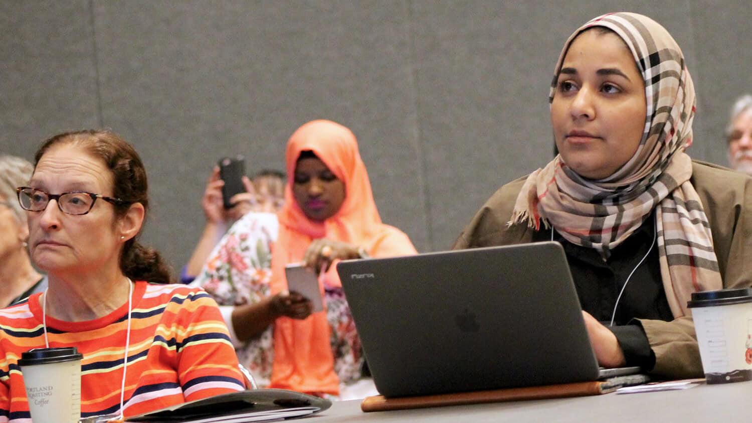 Refugee and Immigrant Health conference attendees involved in a pre-course